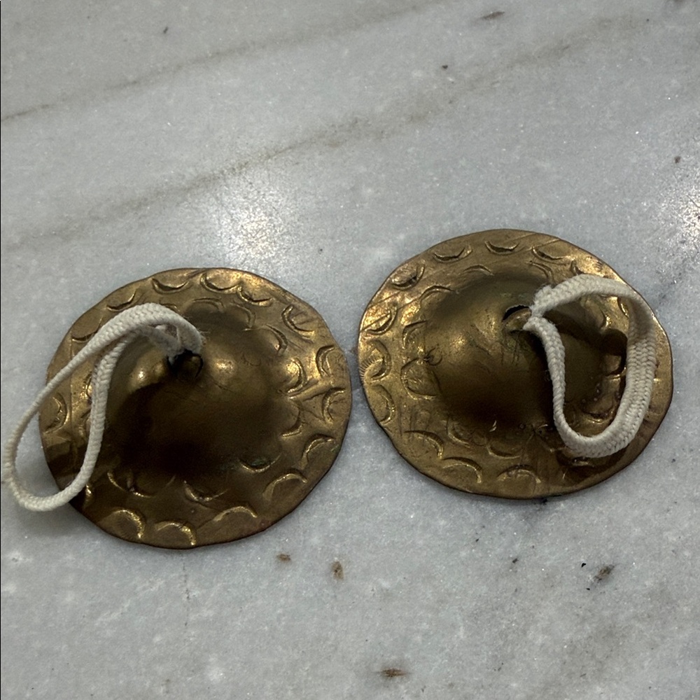 Gold Handheld Cymbals with White Cord